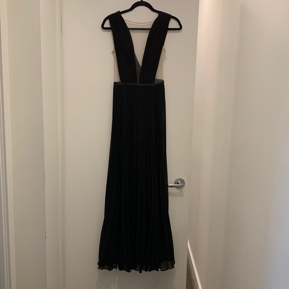 bebe Dresses & Skirts - Bebe maxi dress with sheer long pleated bottom